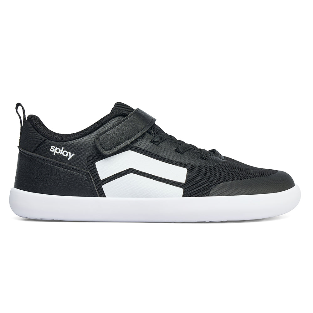 Splay black kids sneaker with white accents, adjustable strap, and lightweight design.