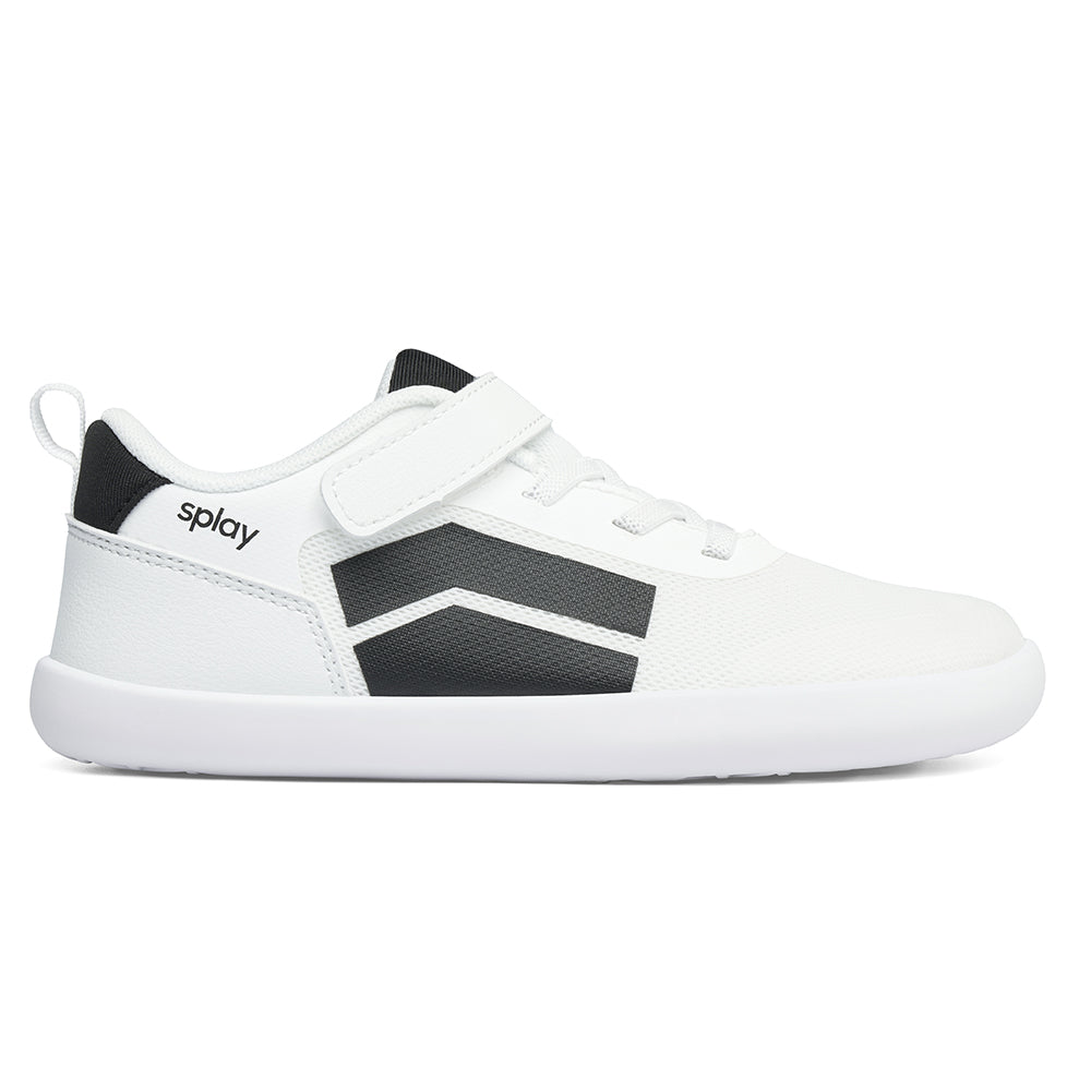 Minimalist white barefoot shoes for kids with flexible soles and wide toe box.