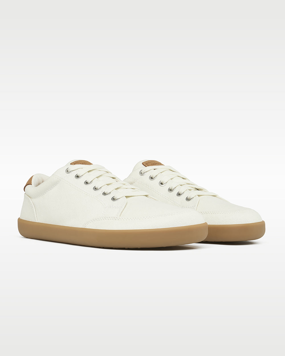 Splay Freestyle Almond barefoot shoes — minimal low-top lace-up sneaker, pair in an angled three-quarter view from the front