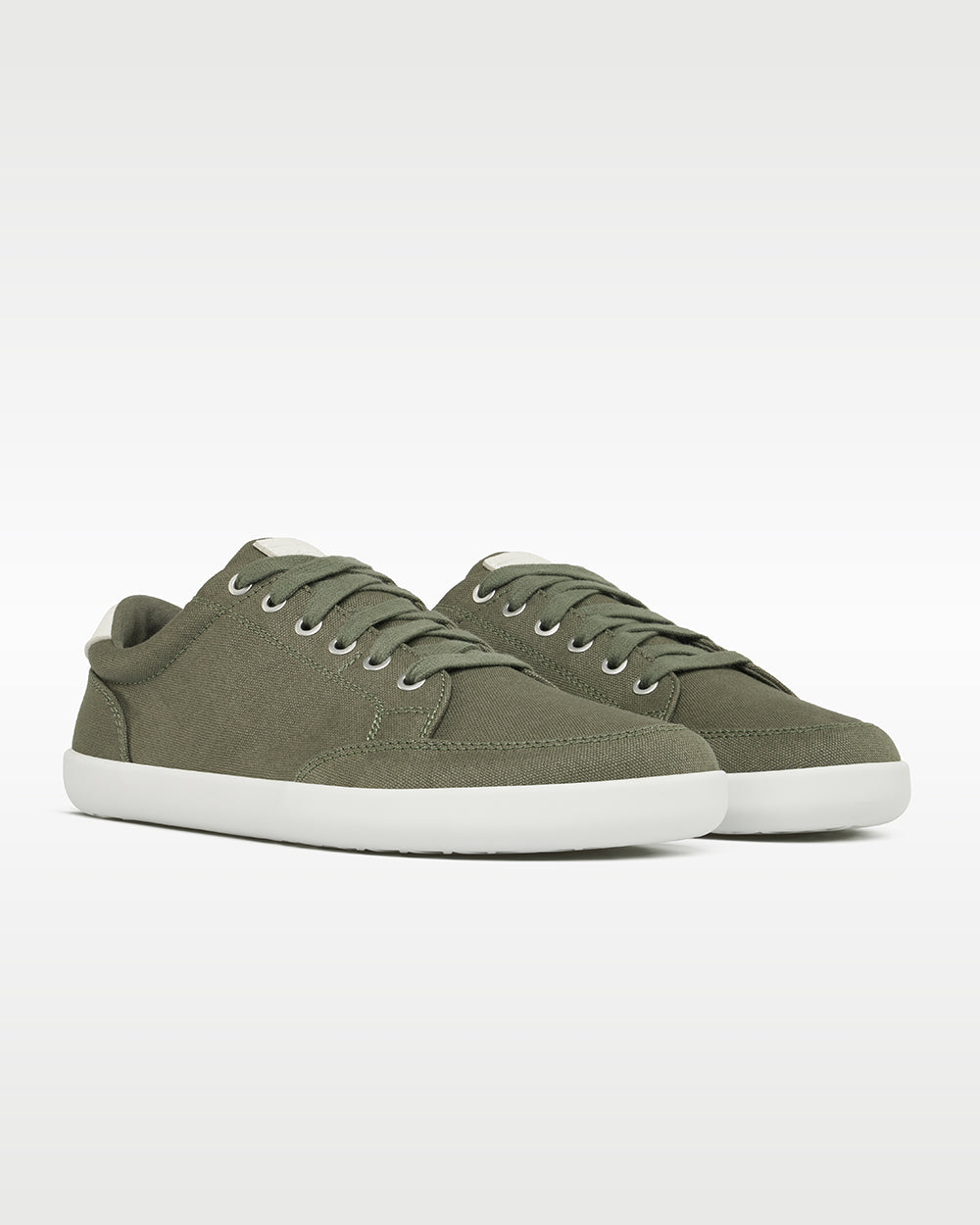 Splay Freestyle Sage barefoot shoes — minimal low-top lace-up sneaker, pair in an angled three-quarter view from the front