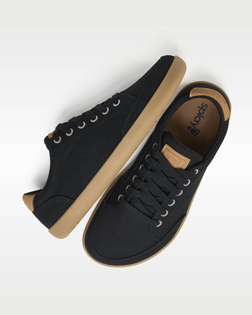 Splay Freestyle Shale barefoot shoes — minimal low-top lace-up sneaker, pair shot from above, one shoe tipped up to show the insole
