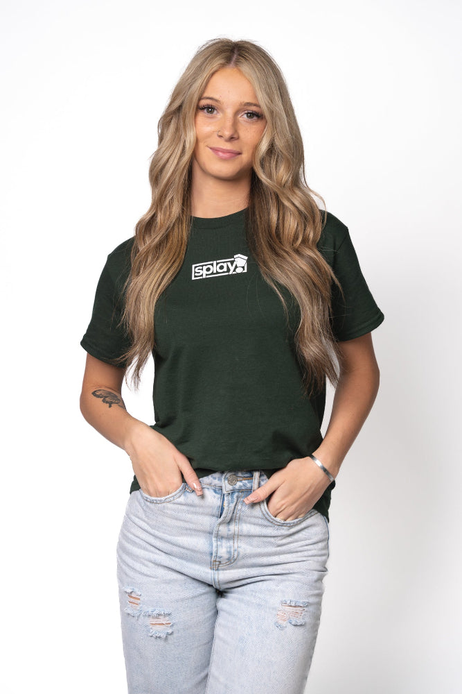 Woman wearing a black t-shirt with a logo and light blue jeans on a white background