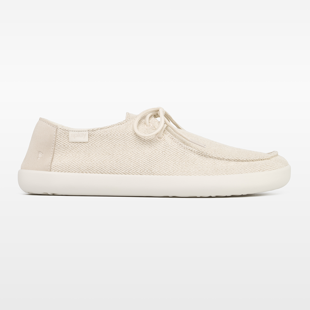 WEEKENDER Sandbar barefoot shoes in natural hemp with a foot-shaped toe box, zero-drop sole, and flexible design.