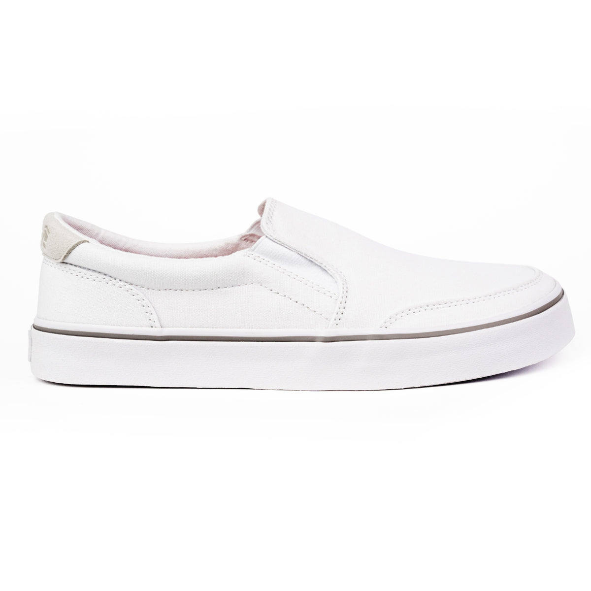 White zero drop slip-on shoe with cushioned sole and flexible, breathable design for all-day comfort.