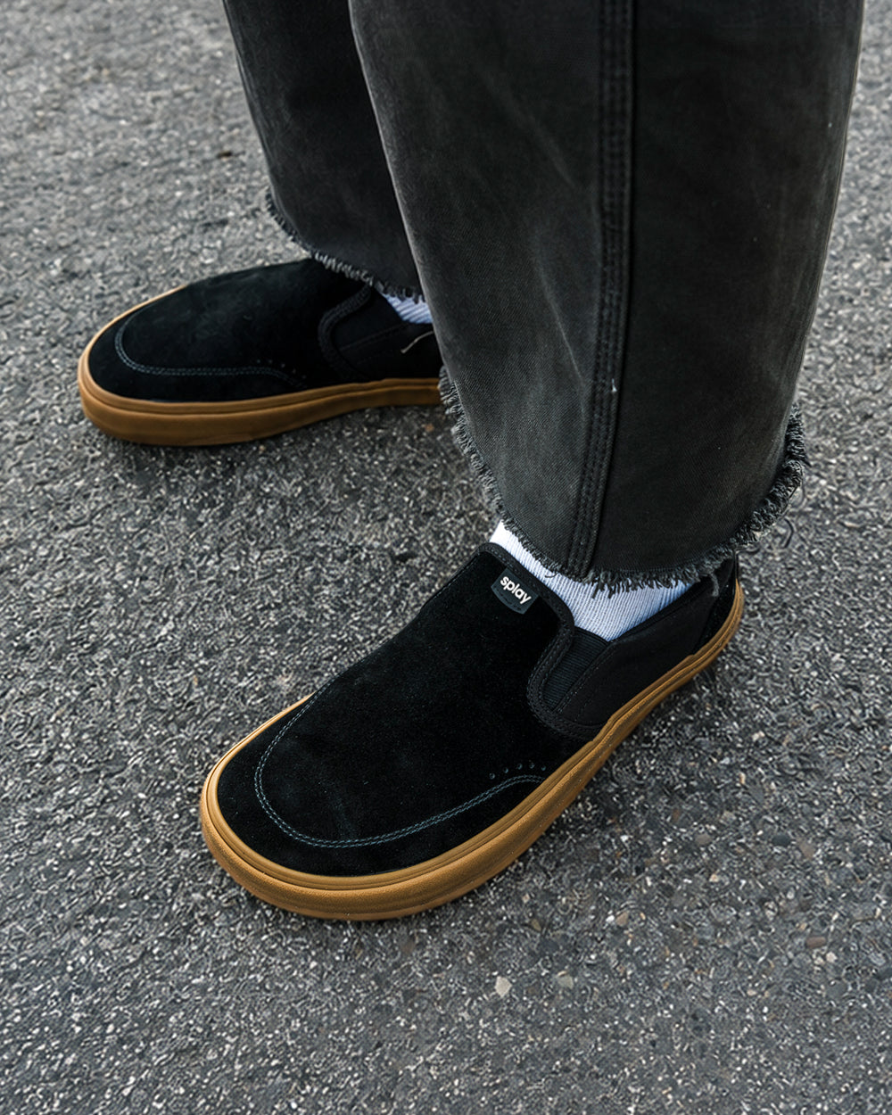 Splay REV SOS Amsterdam barefoot shoes — suede slip-on, lifestyle photo, the shoes shown in use outdoors