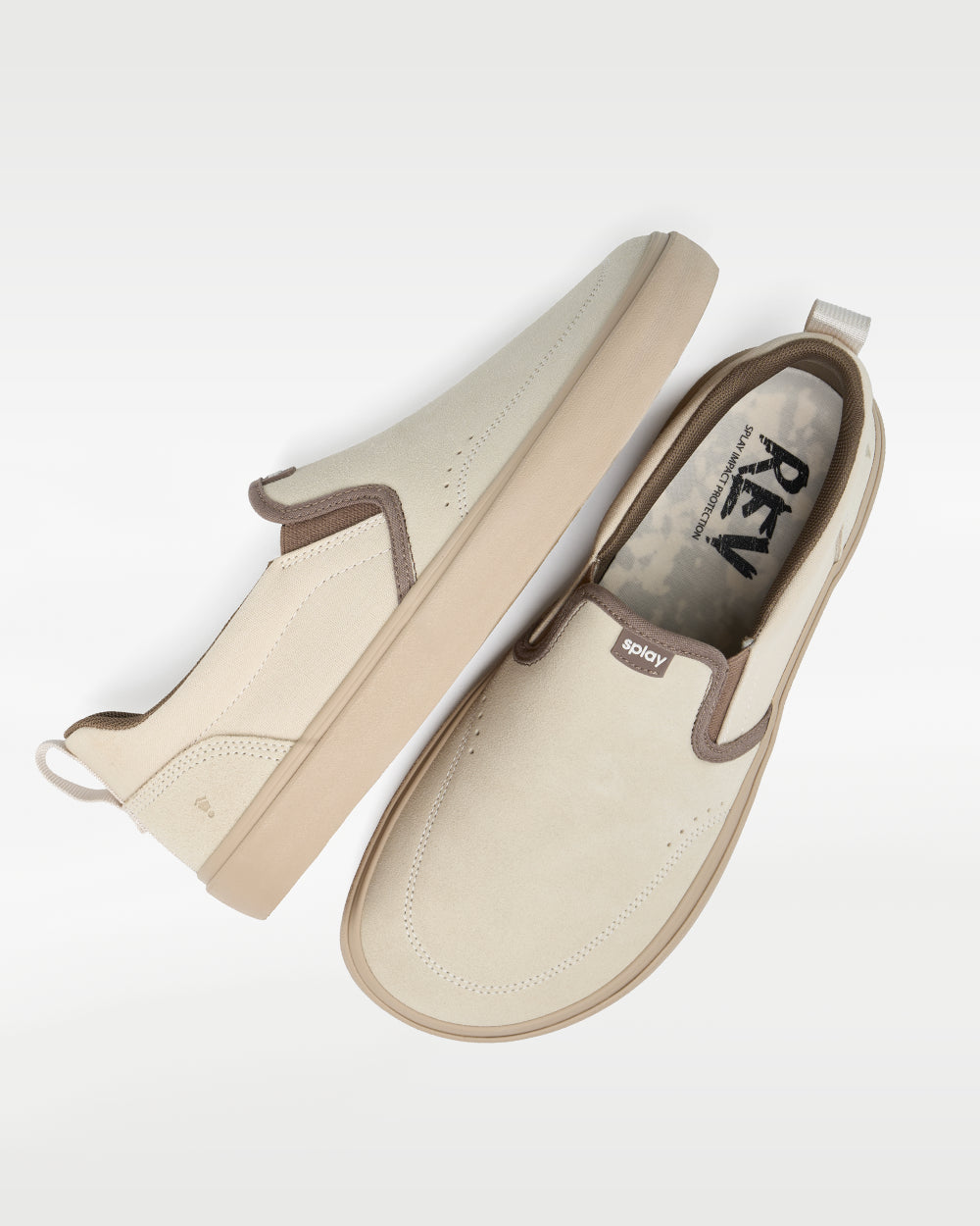 Splay REV SOS Barcelona barefoot shoes — suede slip-on, pair shot from above, one shoe tipped up to show the insole