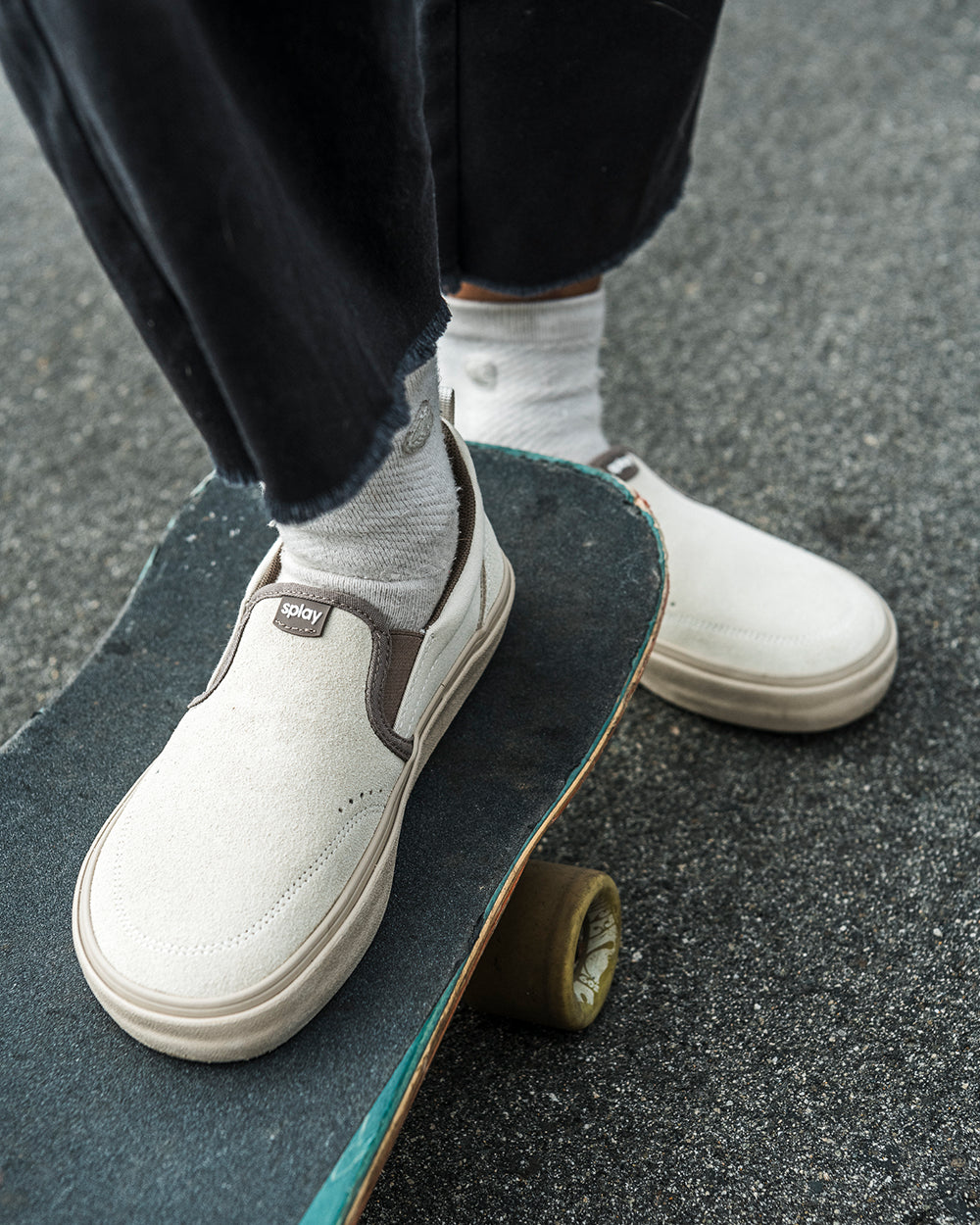 Splay REV SOS Barcelona barefoot shoes — suede slip-on, lifestyle photo, the shoes shown in use outdoors