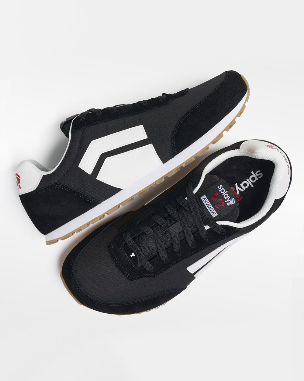 Splay Runner V1 Track Black '26 barefoot shoes — retro nylon-and-suede running shoe, pair shot from above, one shoe tipped up to show the insole