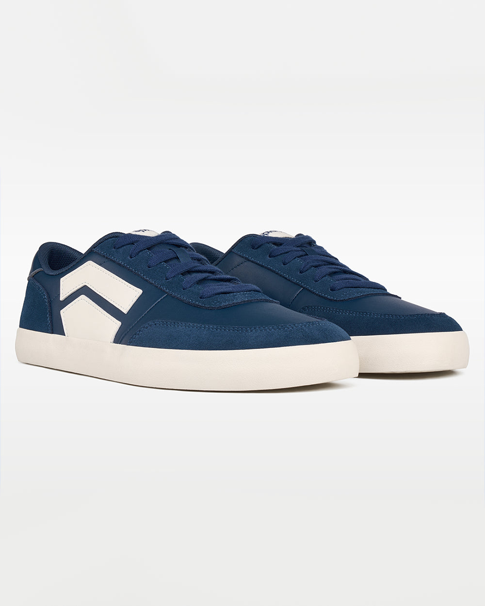 Splay 101 Oxford Blue '26 barefoot shoes — low-top court sneaker with a side stripe and gum sole, pair in an angled three-quarter view from the front