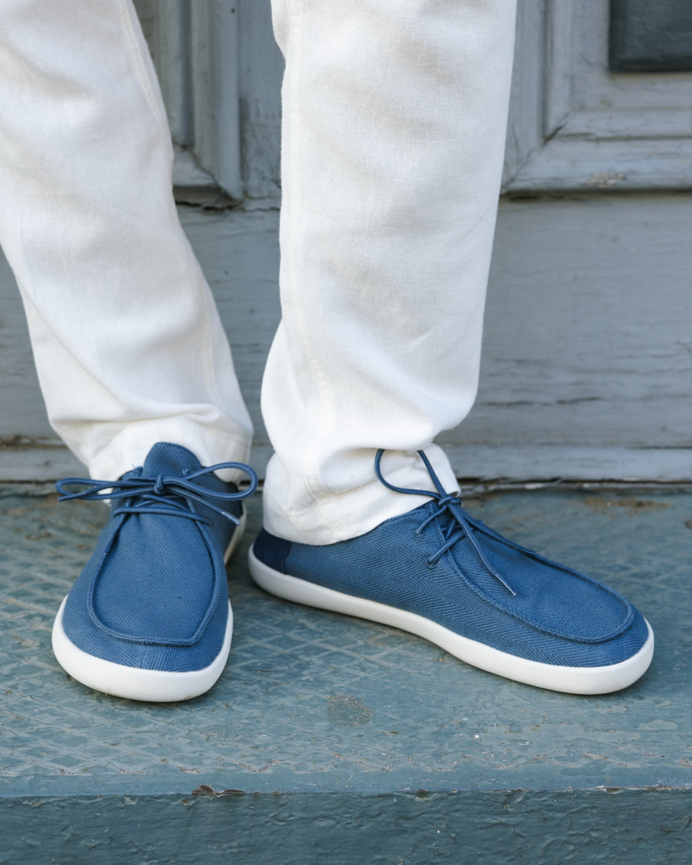 Splay Weekender Blue Lagoon hemp barefoot shoes — hemp moc-toe shoe with laces, lifestyle photo, the shoes shown in use outdoors