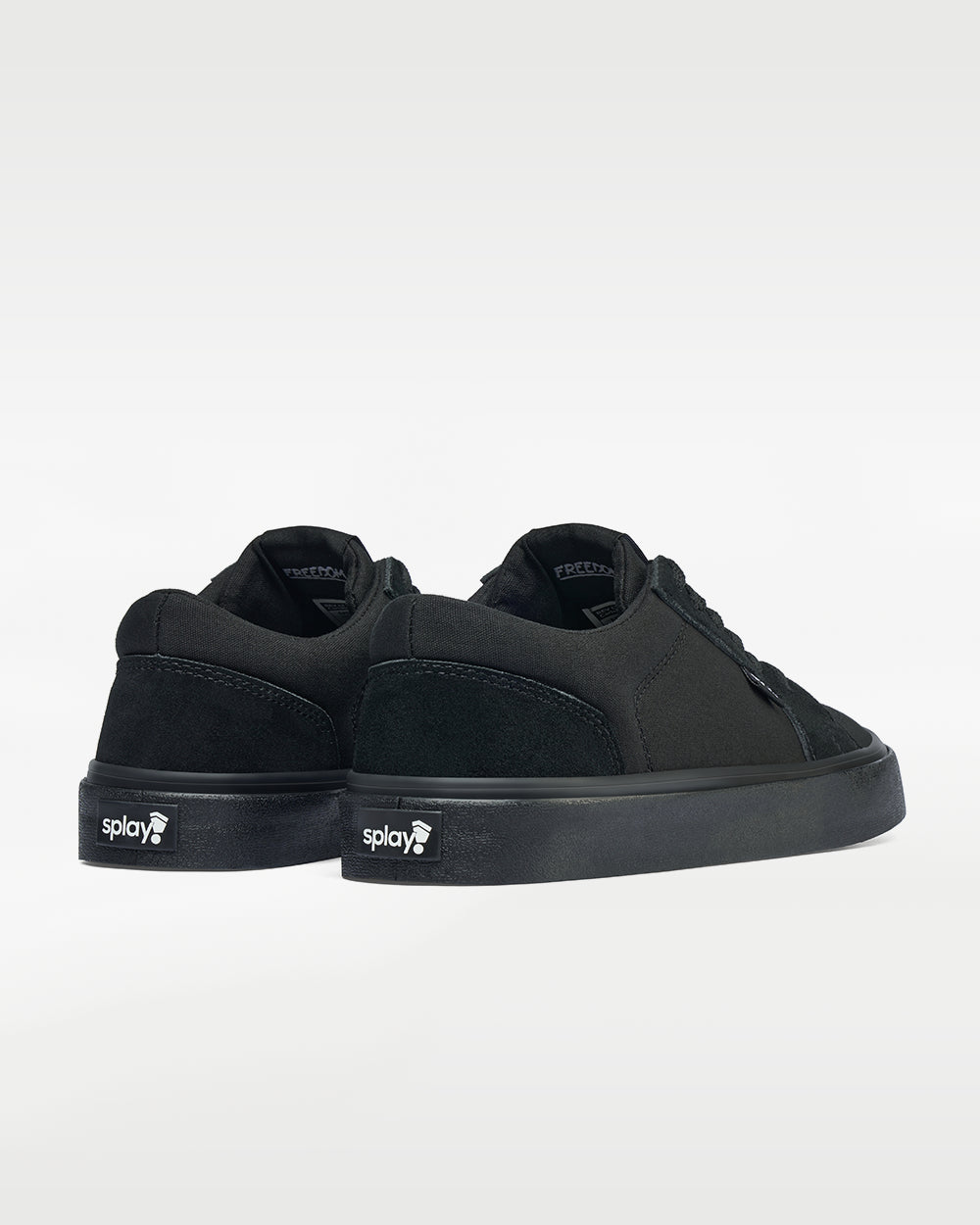Splay REV LT Original Carlsbad barefoot shoes — low-top skate shoe, pair viewed from behind, heels toward the camera