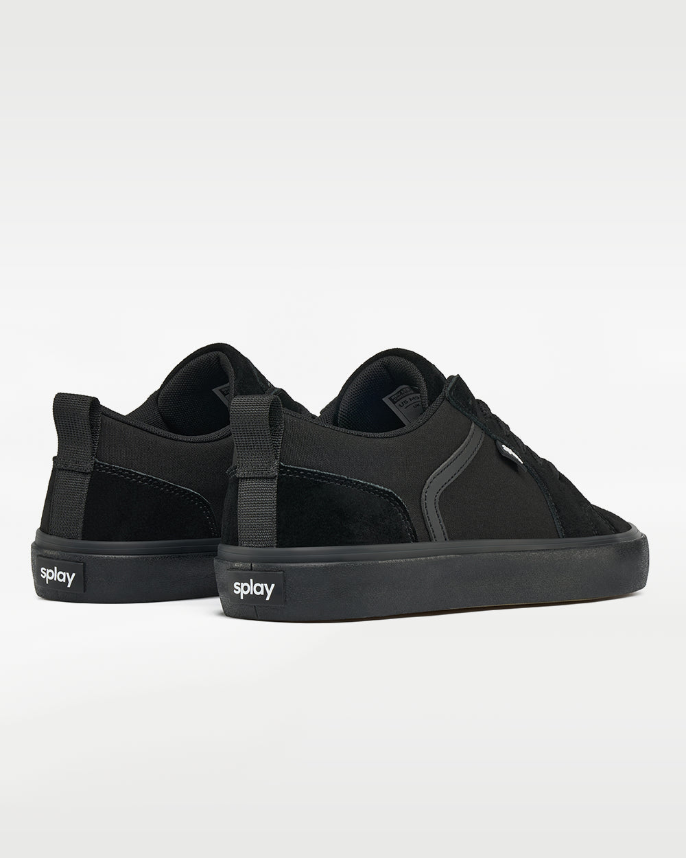 Splay REV LTS Carlsbad barefoot shoes — low-top suede skate shoe, pair viewed from behind, heels toward the camera