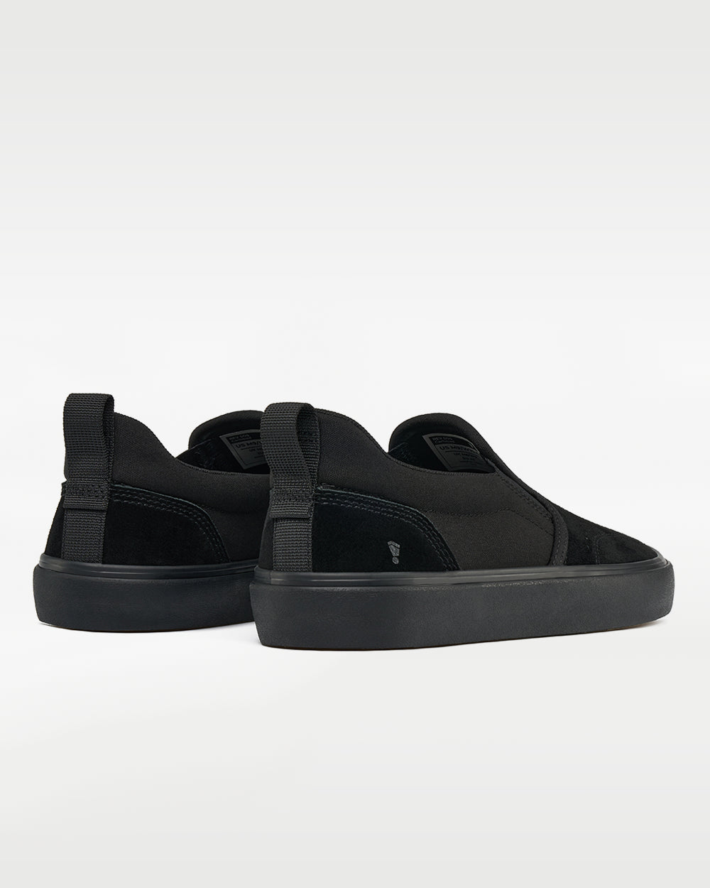 Splay REV SOS Carlsbad barefoot shoes — suede slip-on, pair viewed from behind, heels toward the camera