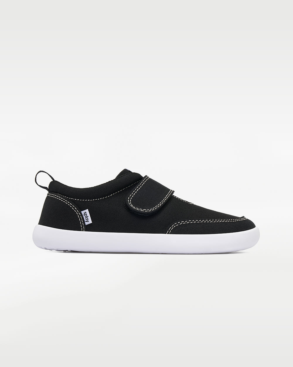 Splay Explore Kids Coal barefoot shoes — kids' low-top shoe with a hook-and-loop strap, single shoe in left-side profile