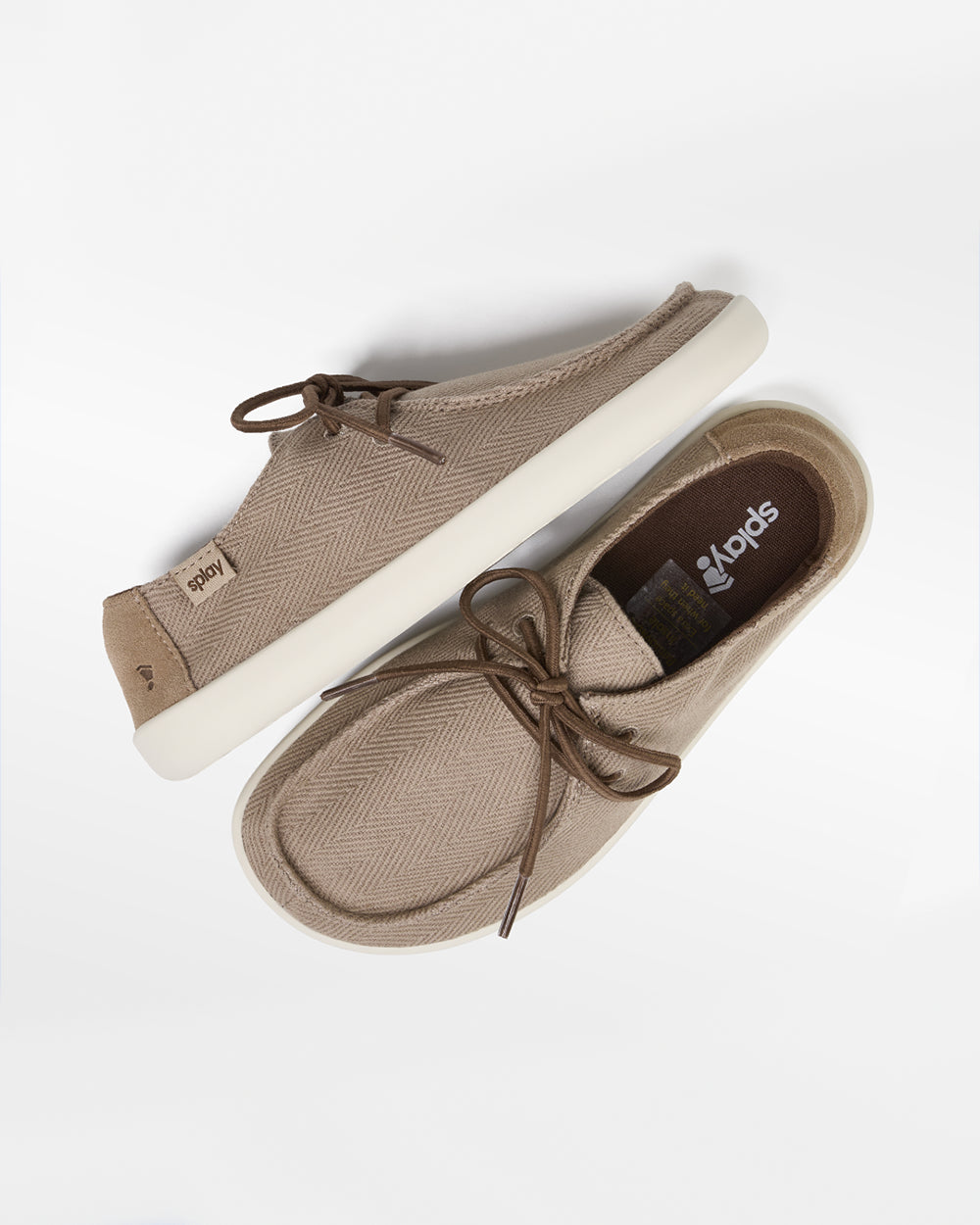 Splay Kids Weekender Driftwood hemp barefoot shoes — kids' hemp moc-toe shoe with laces, pair shot from above, one shoe tipped up to show the insole