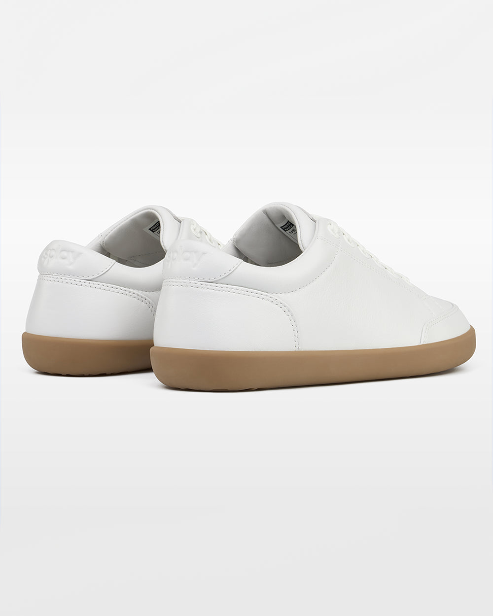 Splay Freestyle Leather Ivory barefoot shoes — leather low-top lace-up sneaker, pair viewed from behind, heels toward the camera