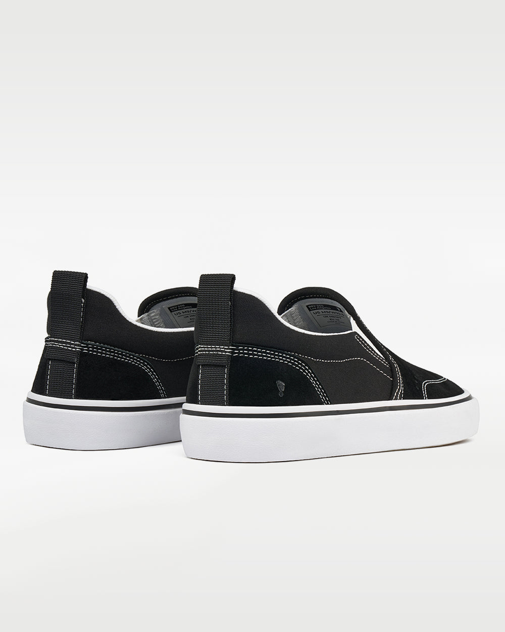 Splay REV SOS Los Angeles barefoot shoes — suede slip-on, pair viewed from behind, heels toward the camera