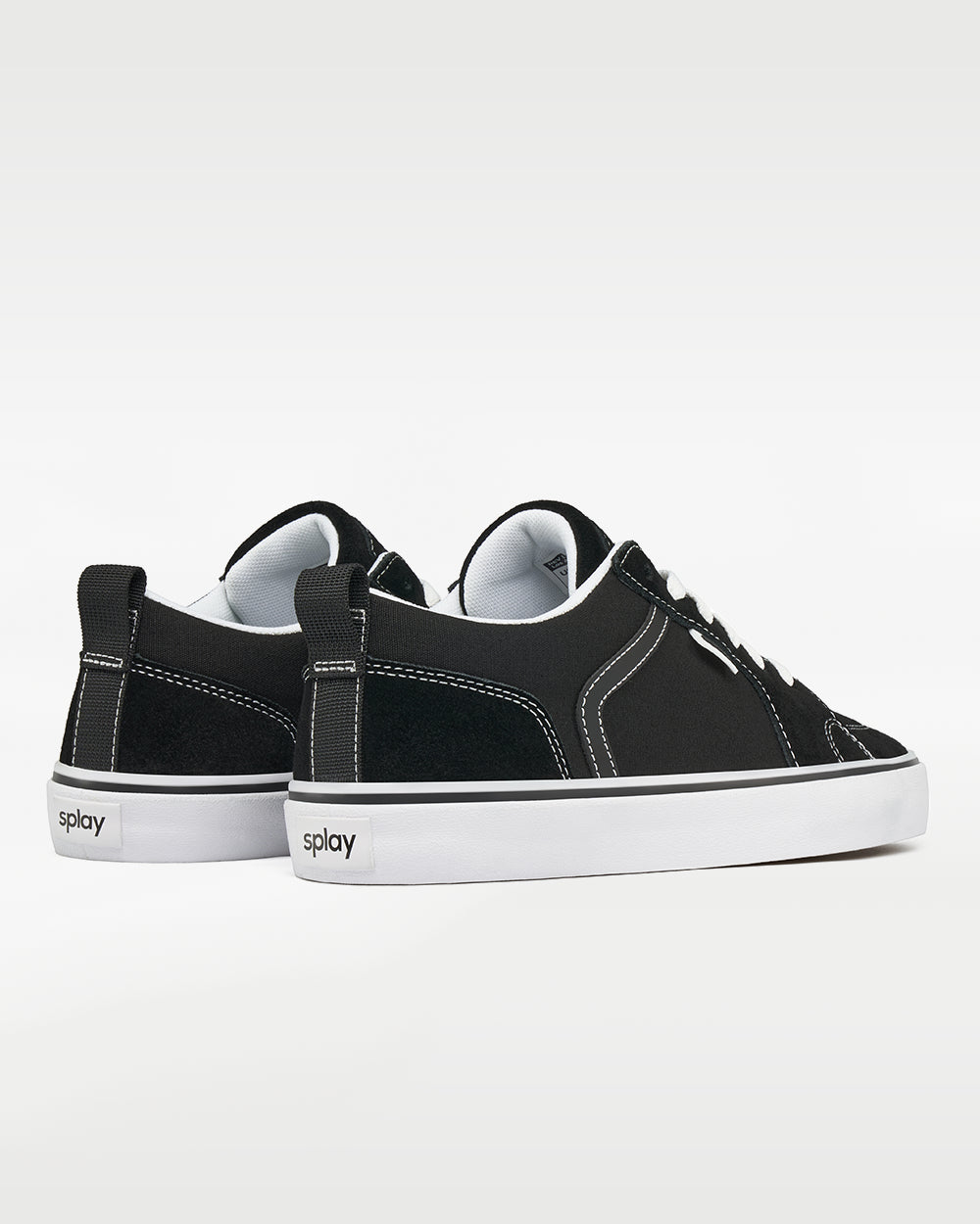 Splay REV LTS Los Angeles barefoot shoes — low-top suede skate shoe, pair viewed from behind, heels toward the camera