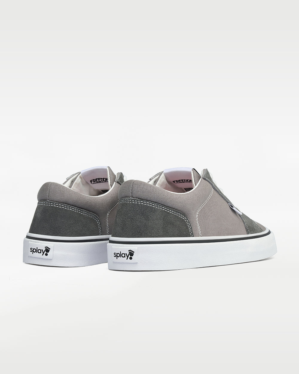 Splay REV LT Original London barefoot shoes — low-top skate shoe, pair viewed from behind, heels toward the camera