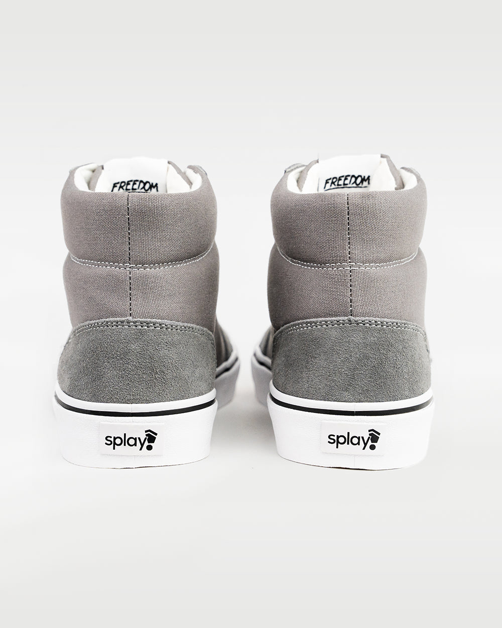 Splay REV HT Original London barefoot shoes — high-top skate shoe, pair viewed from behind, heels toward the camera