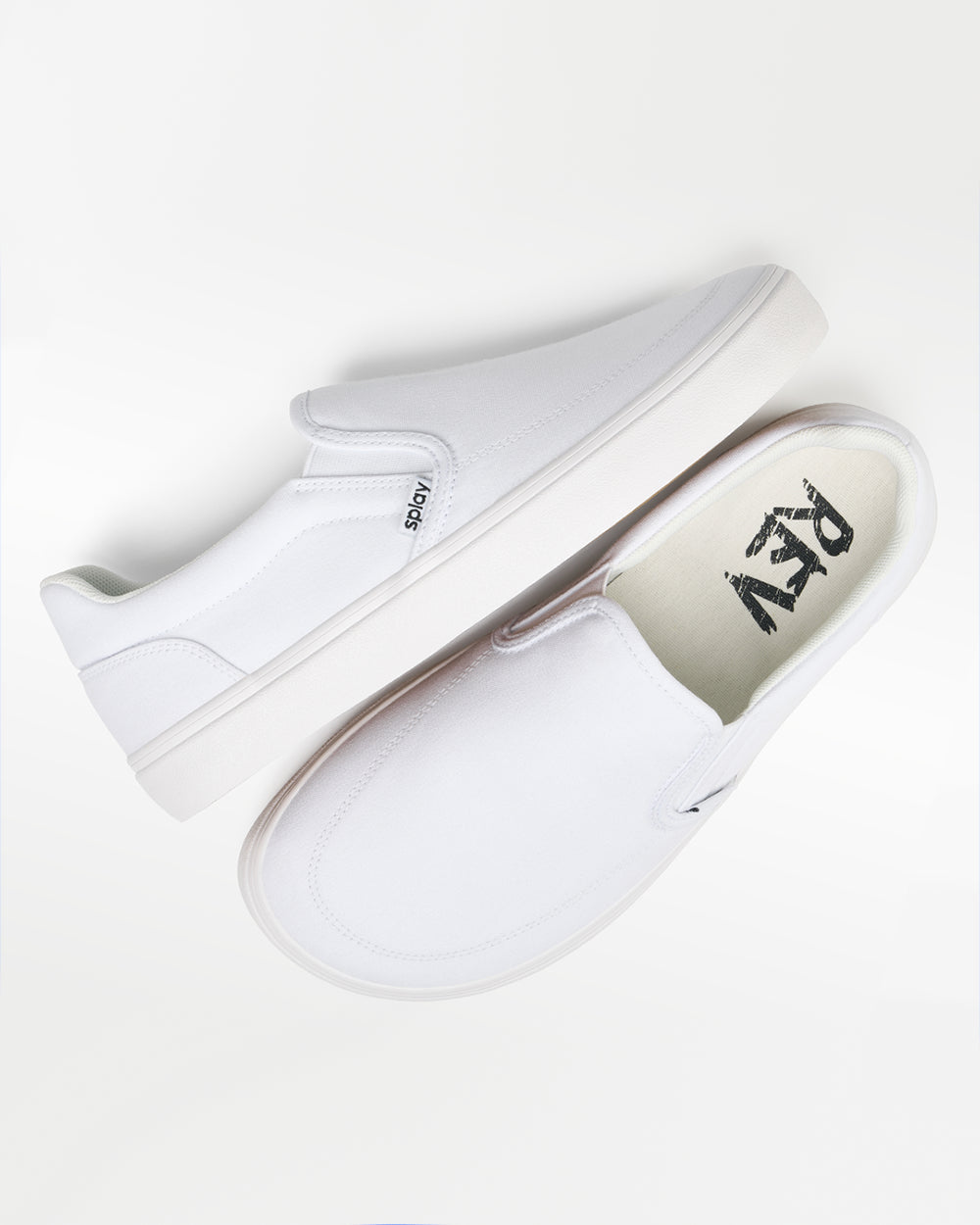 Splay REV SO Malibu barefoot shoes — canvas slip-on, pair shot from above, one shoe tipped up to show the insole