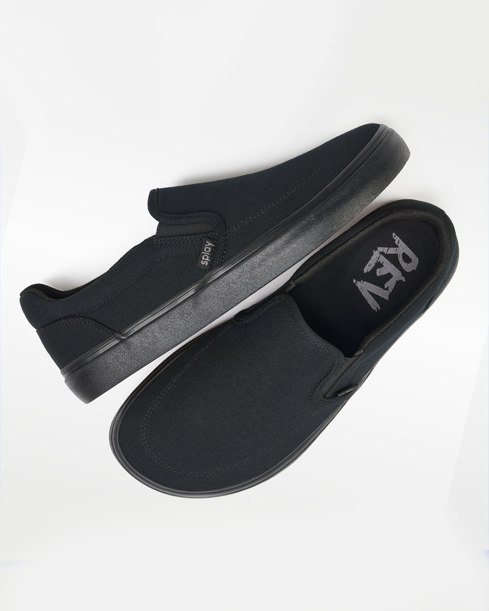 Splay REV SO New York barefoot shoes — canvas slip-on, pair shot from above, one shoe tipped up to show the insole