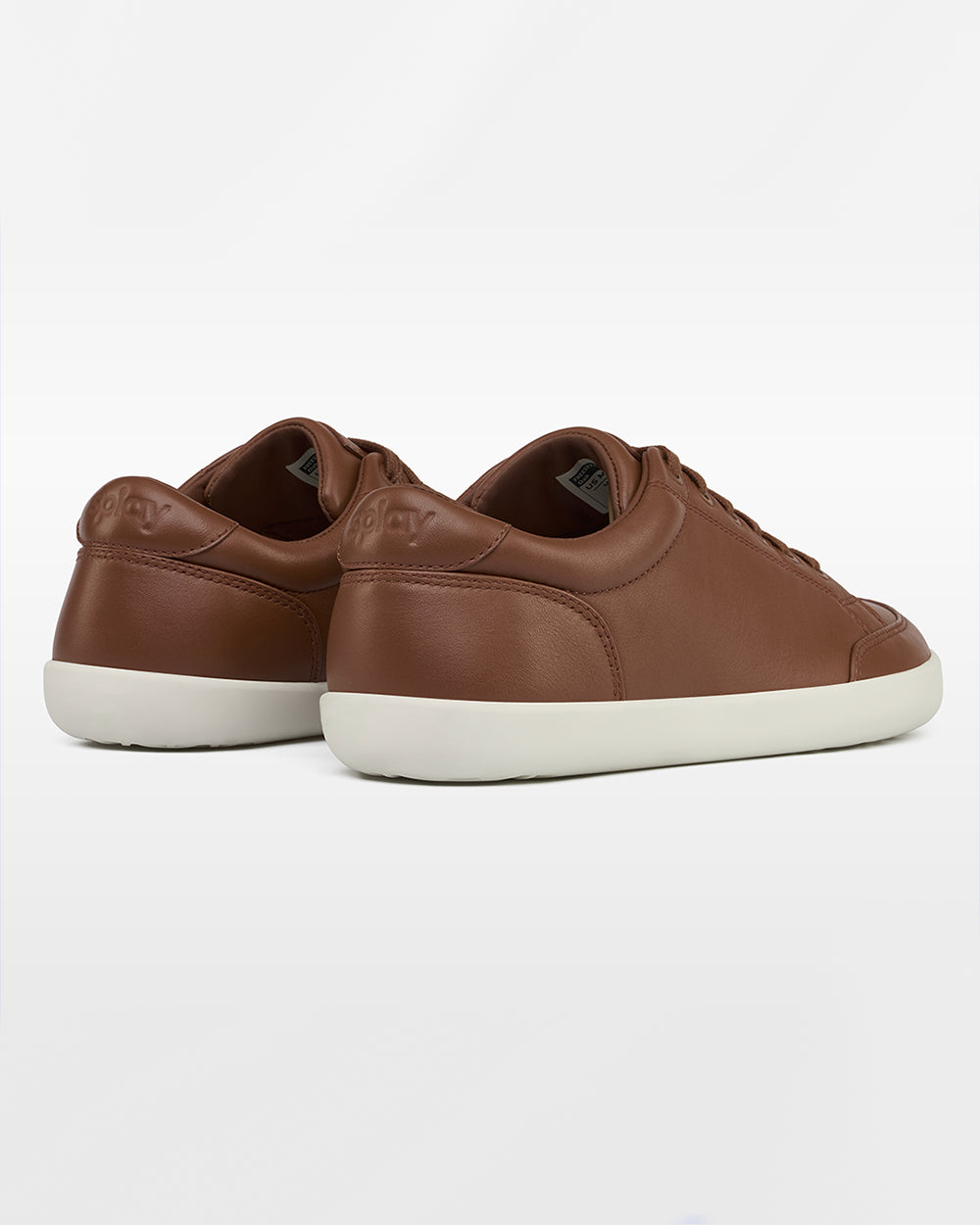 Splay Freestyle Leather Oak barefoot shoes — leather low-top lace-up sneaker, pair viewed from behind, heels toward the camera
