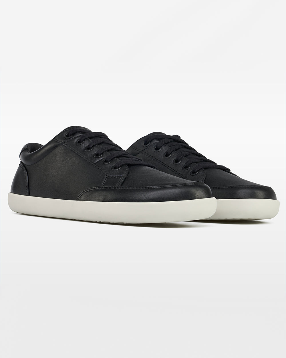 Splay Freestyle Leather Obsidian barefoot shoes — leather low-top lace-up sneaker, pair in an angled three-quarter view from the front