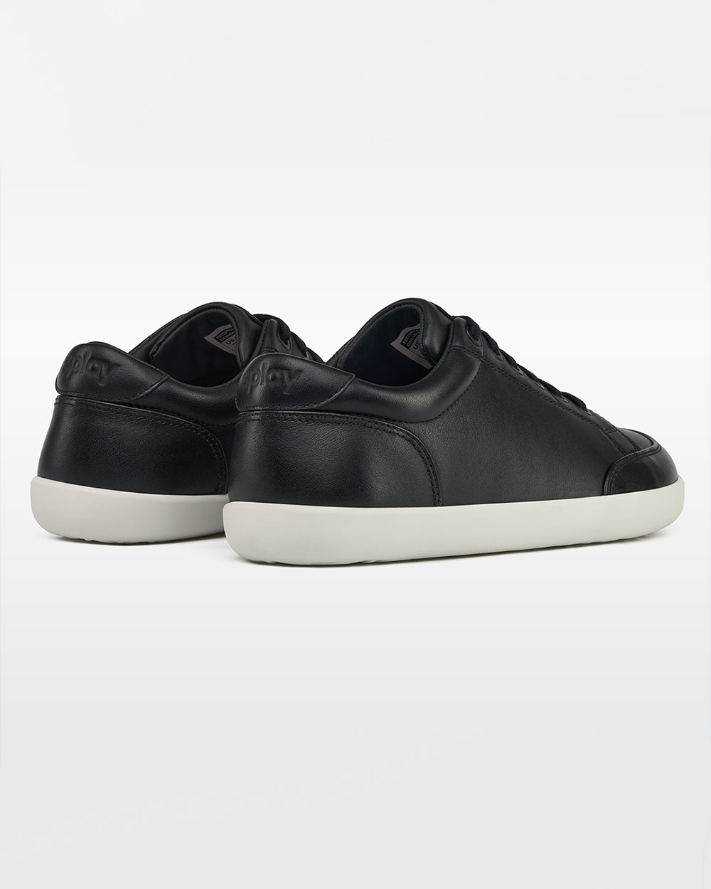 Splay Freestyle Leather Obsidian barefoot shoes — leather low-top lace-up sneaker, pair viewed from behind, heels toward the camera