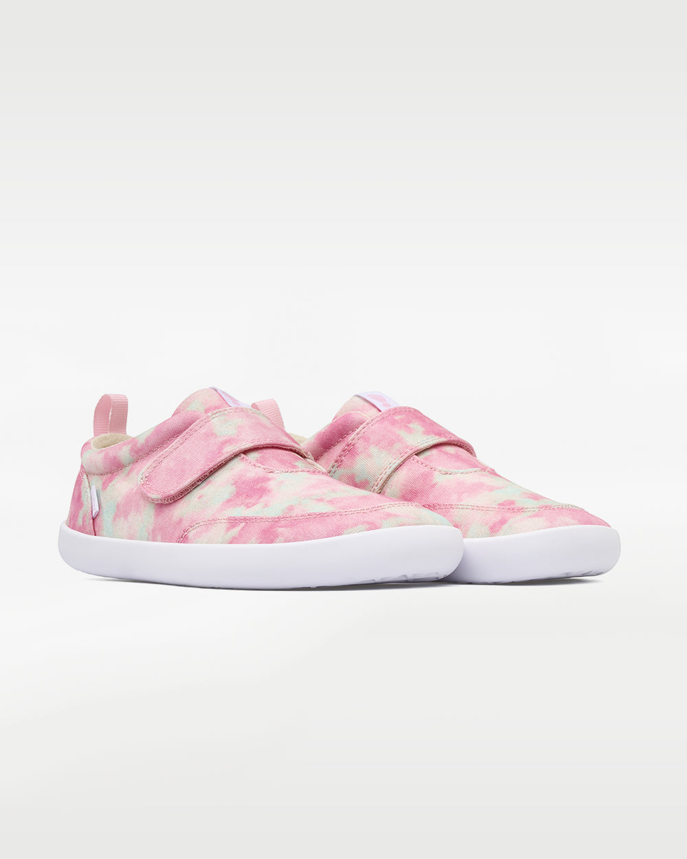 Splay Explore Kids Pink Paradise barefoot shoes — kids' low-top shoe with a hook-and-loop strap, pair in an angled three-quarter view from the front