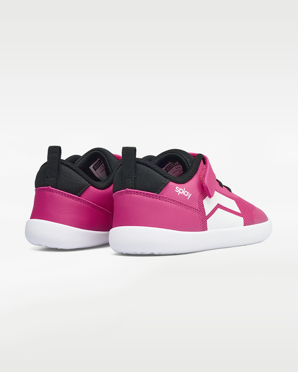Splay Dash Kids Shock Pink barefoot shoes — kids' low-top sneaker with a strap and laces, pair viewed from behind, heels toward the camera