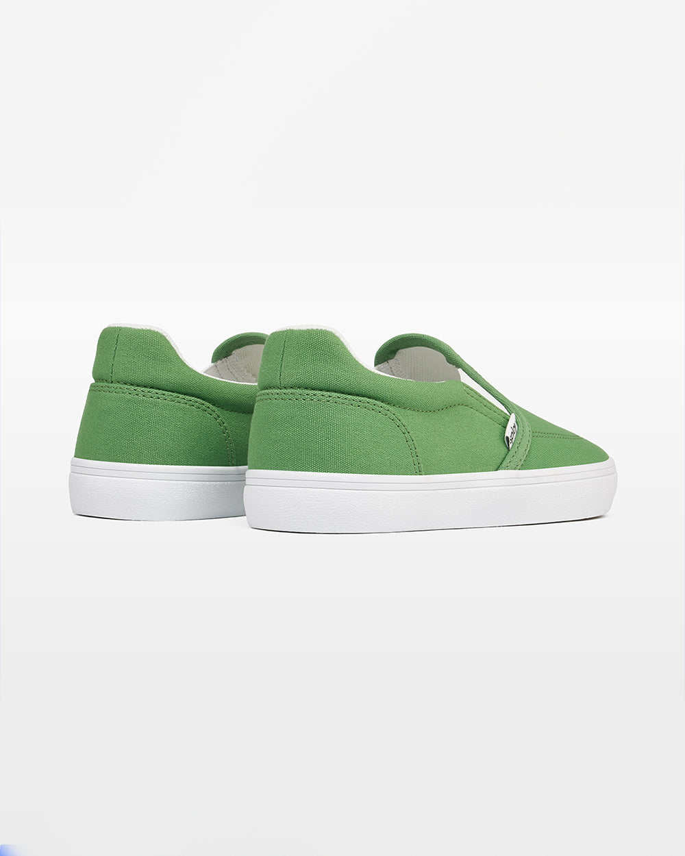 Splay Kids REV SO Rio barefoot shoes — kids' canvas slip-on, pair shot from above, one shoe tipped up to show the insole