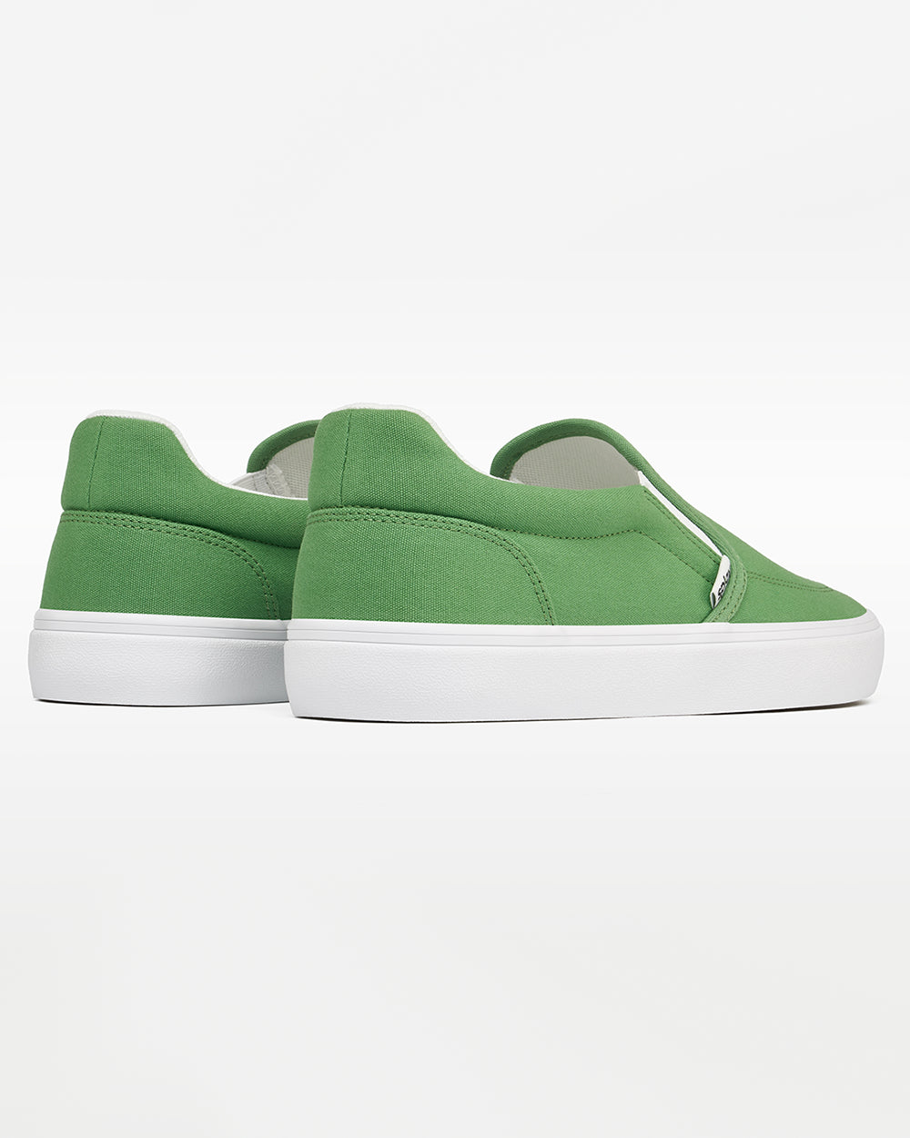 Splay REV SO Rio barefoot shoes — canvas slip-on, pair viewed from behind, heels toward the camera