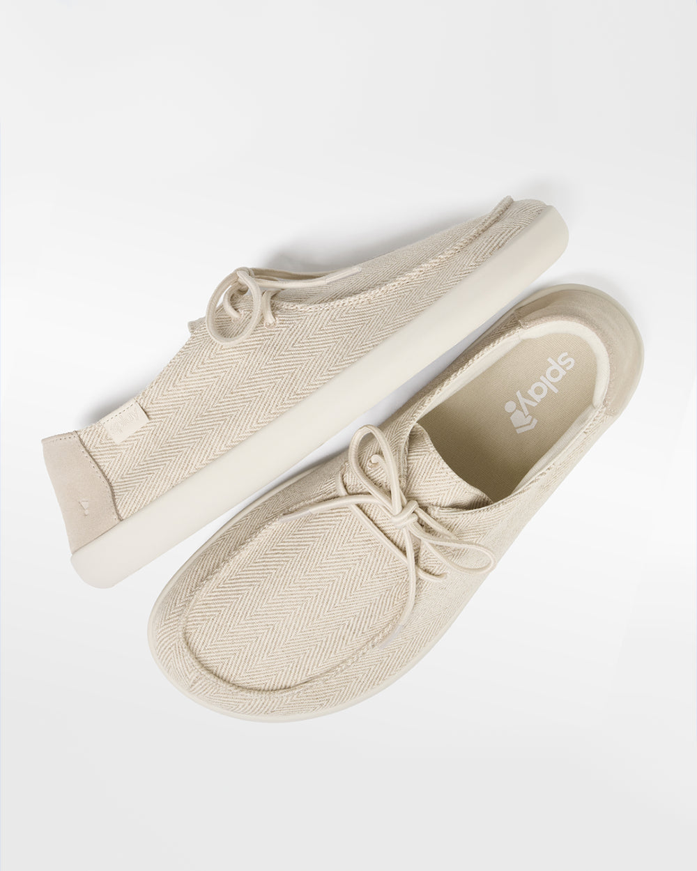 Splay Weekender Sandbar hemp barefoot shoes — hemp moc-toe shoe with laces, pair shot from above, one shoe tipped up to show the insole