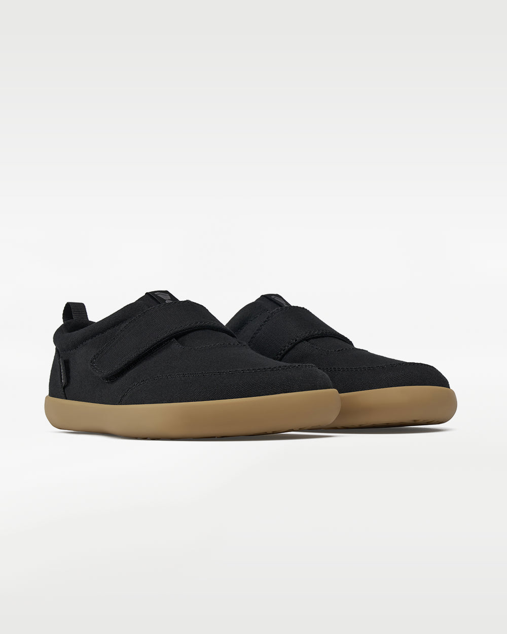 Splay Explore Kids Shale barefoot shoes — kids' low-top shoe with a hook-and-loop strap, pair in an angled three-quarter view from the front