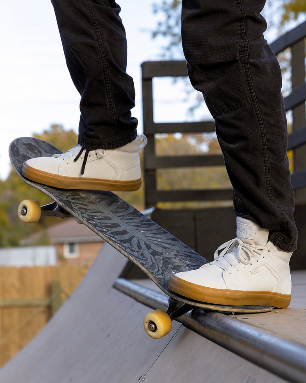 Splay REV HTS Sydney barefoot shoes — high-top suede skate shoe, lifestyle photo, the shoes shown in use outdoors
