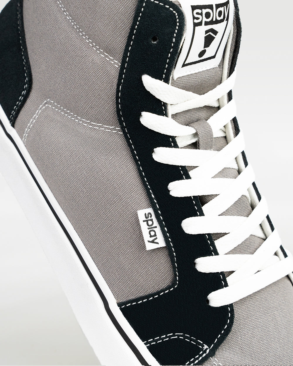 Splay REV HT Original Tokyo barefoot shoes — high-top skate shoe, close-up detail of the upper, laces and logo tab