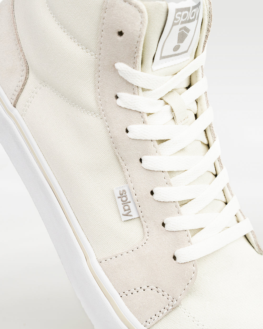 Splay REV HT Original Vienna barefoot shoes — high-top skate shoe, close-up detail of the upper, laces and logo tab