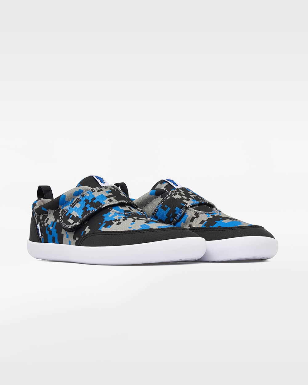 Splay Explore Wild Kids Digicam Blue barefoot shoes — kids' low-top shoe with a hook-and-loop strap, pair in an angled three-quarter view from the front