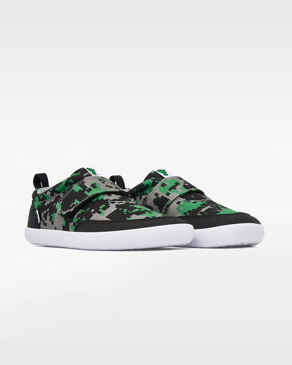 Splay Explore Wild Kids Digicam Green barefoot shoes — kids' low-top shoe with a hook-and-loop strap, pair in an angled three-quarter view from the front