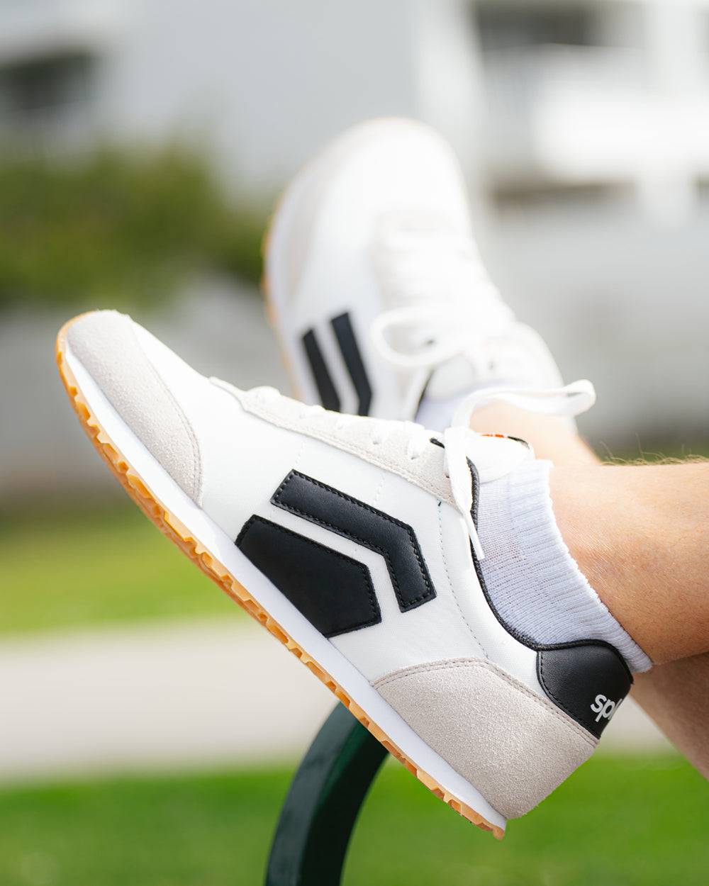 Splay Runner V1 Varsity White '26 barefoot shoes — retro nylon-and-suede running shoe, lifestyle photo, the shoes shown in use outdoors